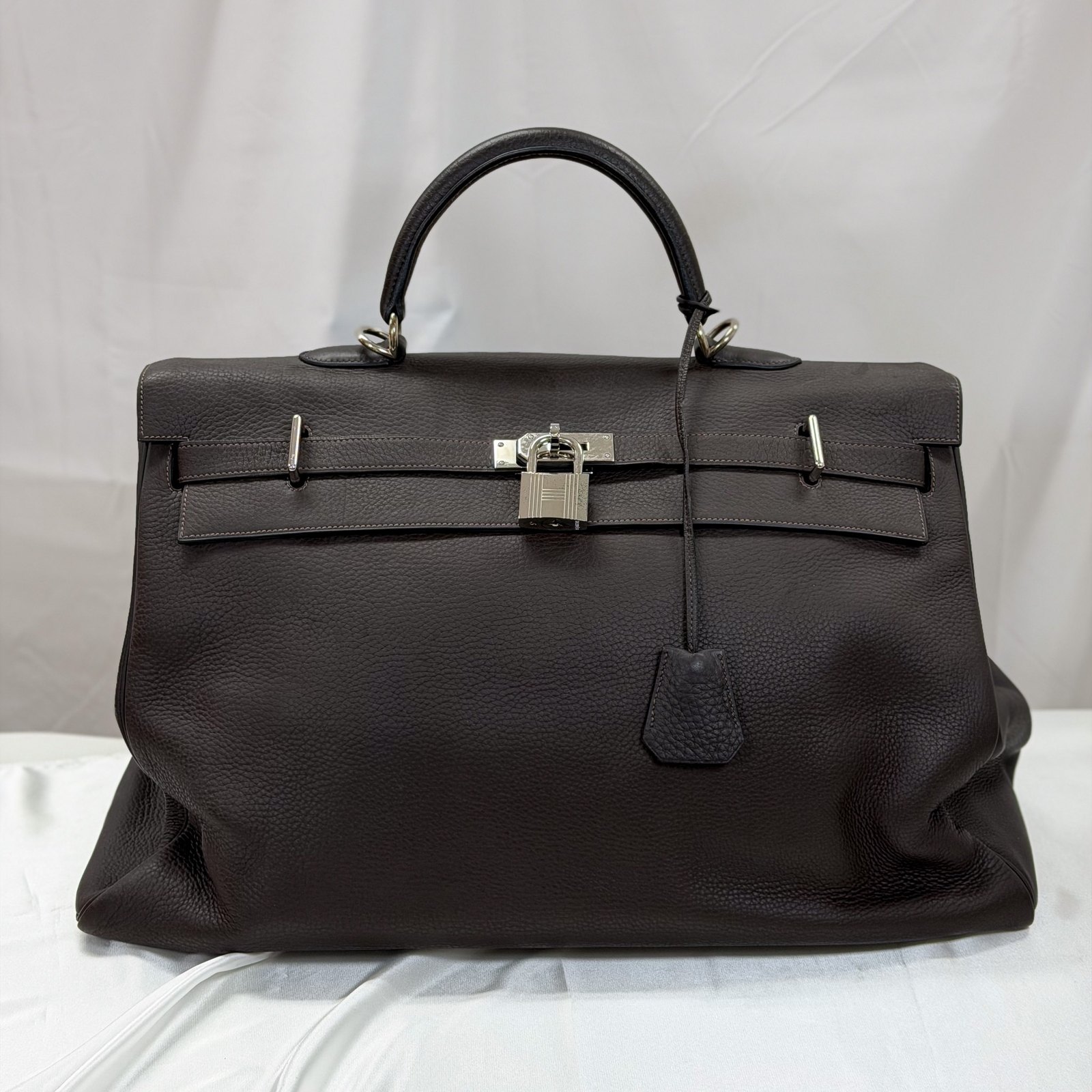 HERMÈS Travel Kelly 50 — Ébène Taurillon Clémence, Palladium Hardware